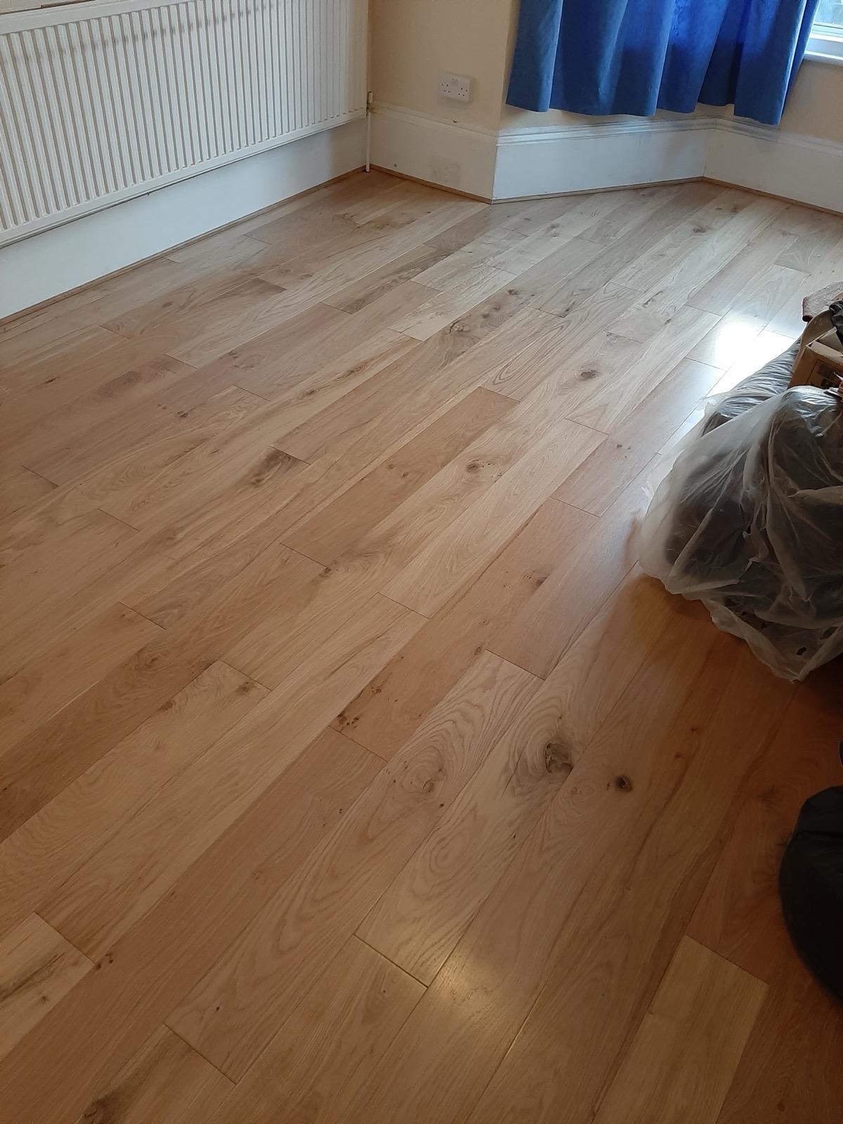 Engineered oak flooring with natural grain pattern in hallway
